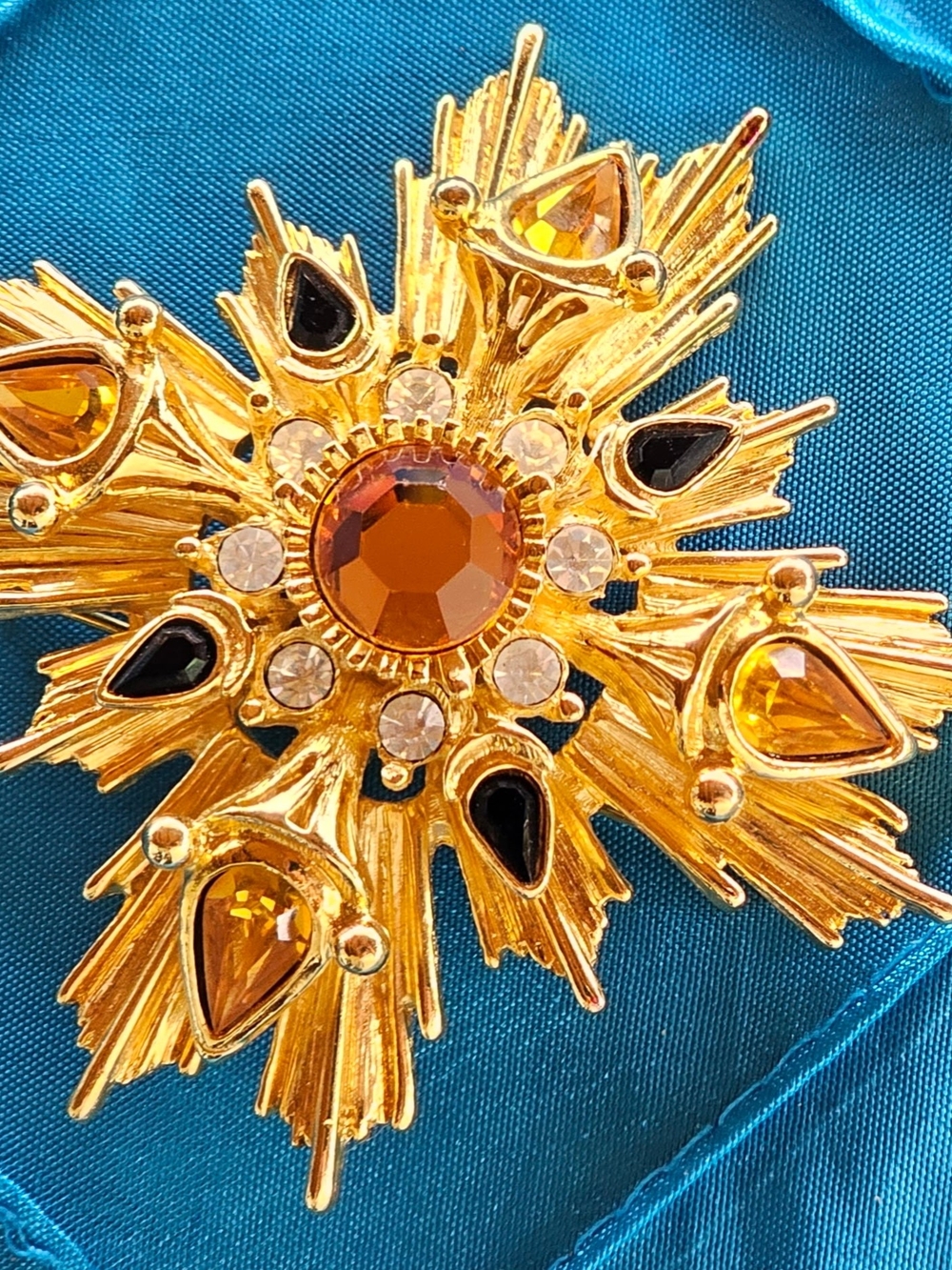 Vintage Joan Rivers Gold-Tone Amber and Black Cross Starburst Brooch